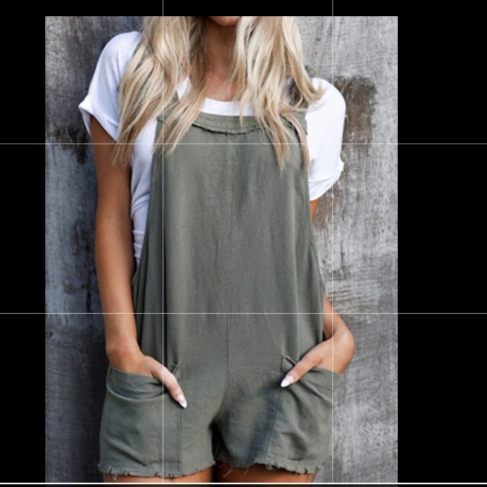 loose green strapped lace-up romper with pockets